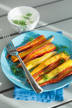 roasted colorful carrots on plate