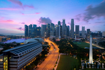 Panorama of Singapore business district skyline and Singapore skyscraper with War Memorial Park in night at Marina Bay, Singapore.