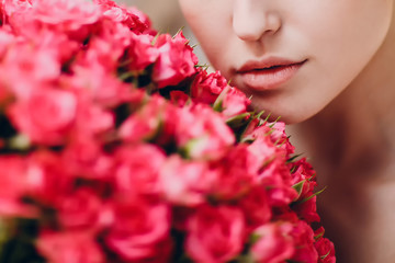 Fototapeta premium Pretty young female and flowers
