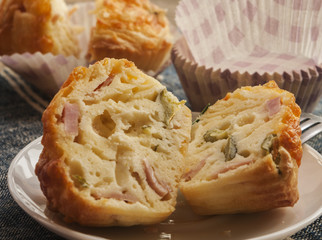 Savory cheese and bacon muffins on the wooden table