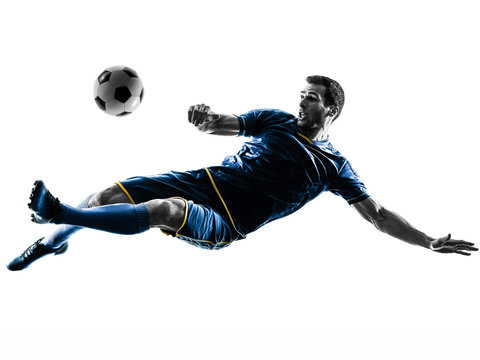 Fototapeta one caucasian soccer player man playing kicking in silhouette isolated on white background