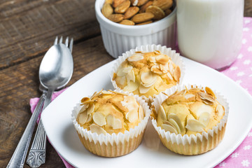 Tasty sugar muffins with almond and walnuts
