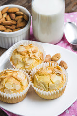 Tasty sugar muffins with almond and walnuts