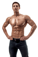 Fototapeta premium Muscular handsome young man with naked torso. Isolated on white background.