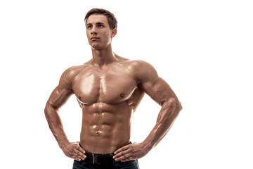 Fototapeta premium Muscular handsome young man with naked torso. Isolated on white background.