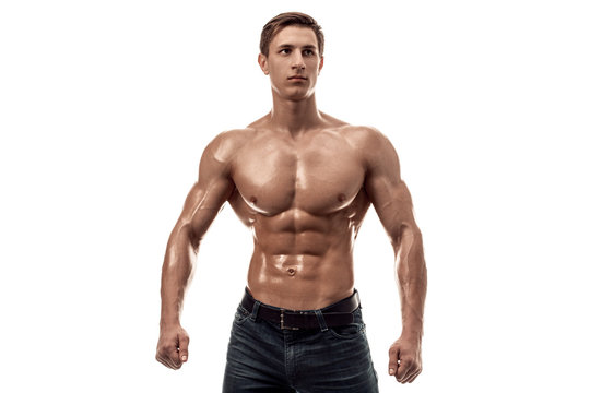 Muscular Handsome Young Man With Naked Torso. Isolated On White Background. Copy Space