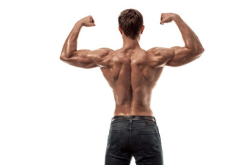 Strong Athletic Man Fitness Model posing back muscles, triceps over white background. Copy space