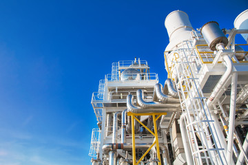 Exhaust of gas turbine engine at offshore oil and gas platform Cooling tower exhaust of oil and gas plant, Cooling hot gas in production process and turbine SKID by cooling tower system