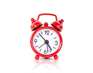red vintage alarm clock islolated on white background