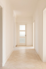 Empty white corridor