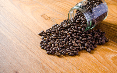 roasted coffee beans from glass jar