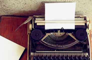 Fototapeta na wymiar Vintage Typewriter with paperwork 