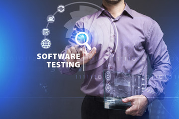 Business, Technology, Internet and network concept. Young businessman working on a virtual screen of the future and sees the inscription: Software testing