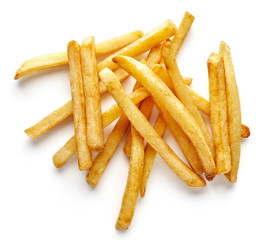 Heap of french fries isolated on white, from above