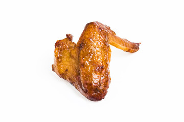 Grilled chicken wings on a white background