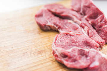 Fresh red meat on a cutting board 2
