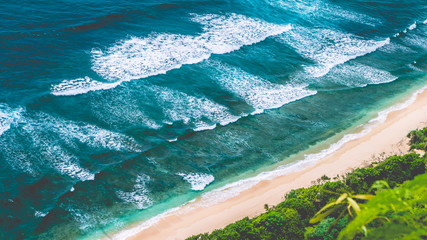 Aerial view of Nunggalan Beach near Uluwatu, Bali, Indonesia