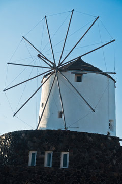 Windmill in a mountain village at Santorini island, Greece