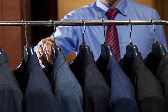 Row Of Men's Suits Hanging
