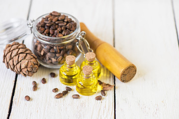 The cedar oil in a glass bottle