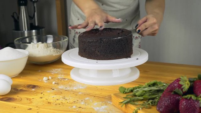 Cutting Cake on Layers. Making Chocolate Layer Cake. Series.