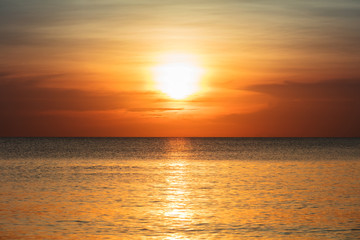 Fototapeta na wymiar sunset over the tranquil ocean