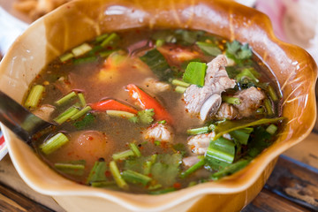 hot and spicy pork rib hot pot with tamarind and Thai herbs