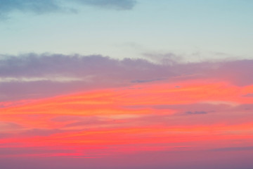 Dramatic  sunset sky with red orange purple clouds. Natural background