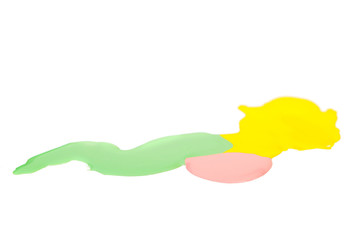 Blot of yellow, pink and green nail polish isolated on  white background