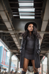A portrait of a young, attractive, black woman in Brooklyn, New York City. Shot with fashion and lifestyle in mind during the Spring 2017.