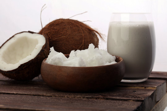 Coconut vegan milk non dairy in bottle and coconut oil