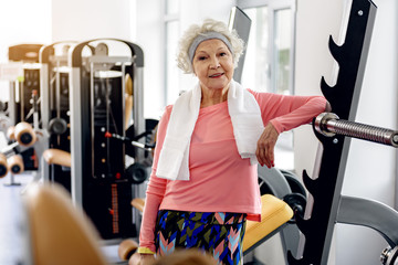 happy grandmother in fitness center