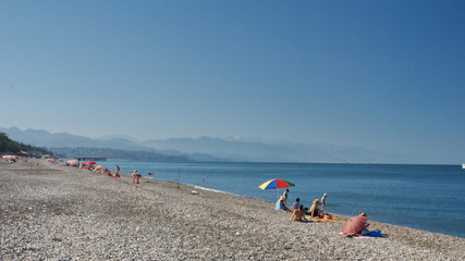 Holidaymakers on the sea beach