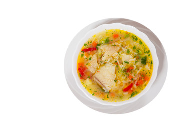 Fish soup with vegetables and rice. top view. isolated on white