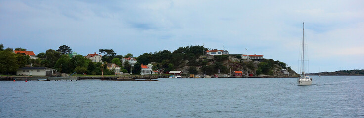 Fototapeta na wymiar Sailing boat near Gothenburg. The islands of Gothenburg's archipelago are a popular tourist destination