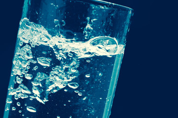 Aqua fresh drink water with bubble liquid drinking in art color tone.
