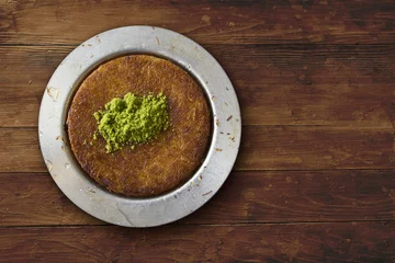 Fotobehang Kunafeh traditional turkish dessert on table top view © Krasimira Dicheva