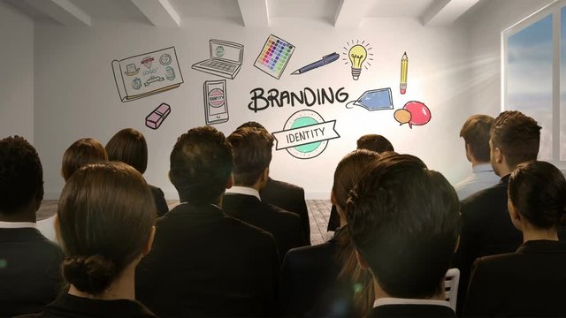 Business people looking at digital screen showing branding