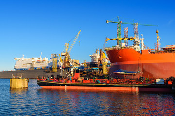 Crude oil tanker under repair in the shipyard. Gdansk, Poland.