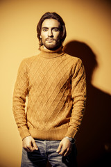 guy in yellow pullover