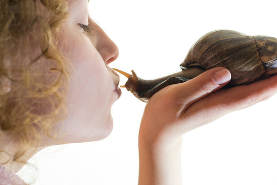 Girl kiss african Achatina snail