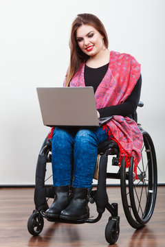 Disabled lady surfing on web.