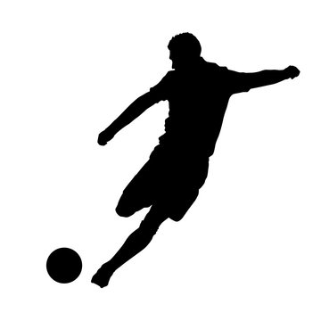 Soccer player kicking ball, front view