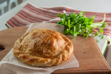 Puff pastry rolls with ham, salami and cheese