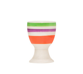 one empty color egg cup on white background