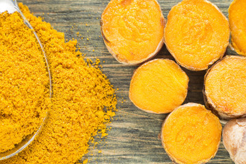 Roots and turmeric powder (Curcuma longa)