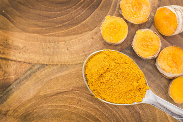 Roots and turmeric powder (Curcuma longa)