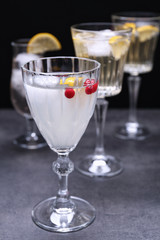 Different refreshing cocktails on table