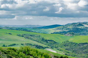 Fototapeta premium Panorama of Volterra's lands and hills in the spring