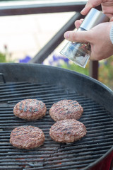 grilling meat and vegetables on grill